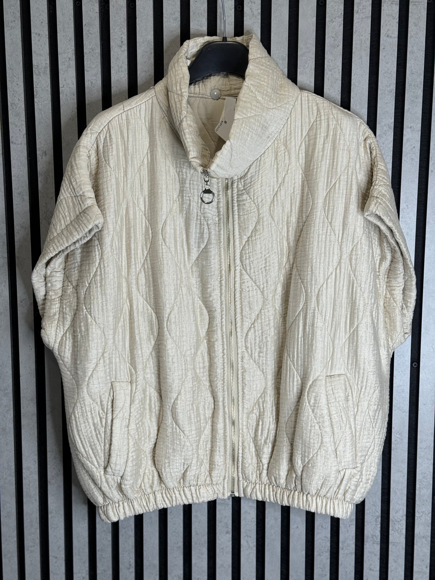 Cream Quilted Funnel Neck Gilet.