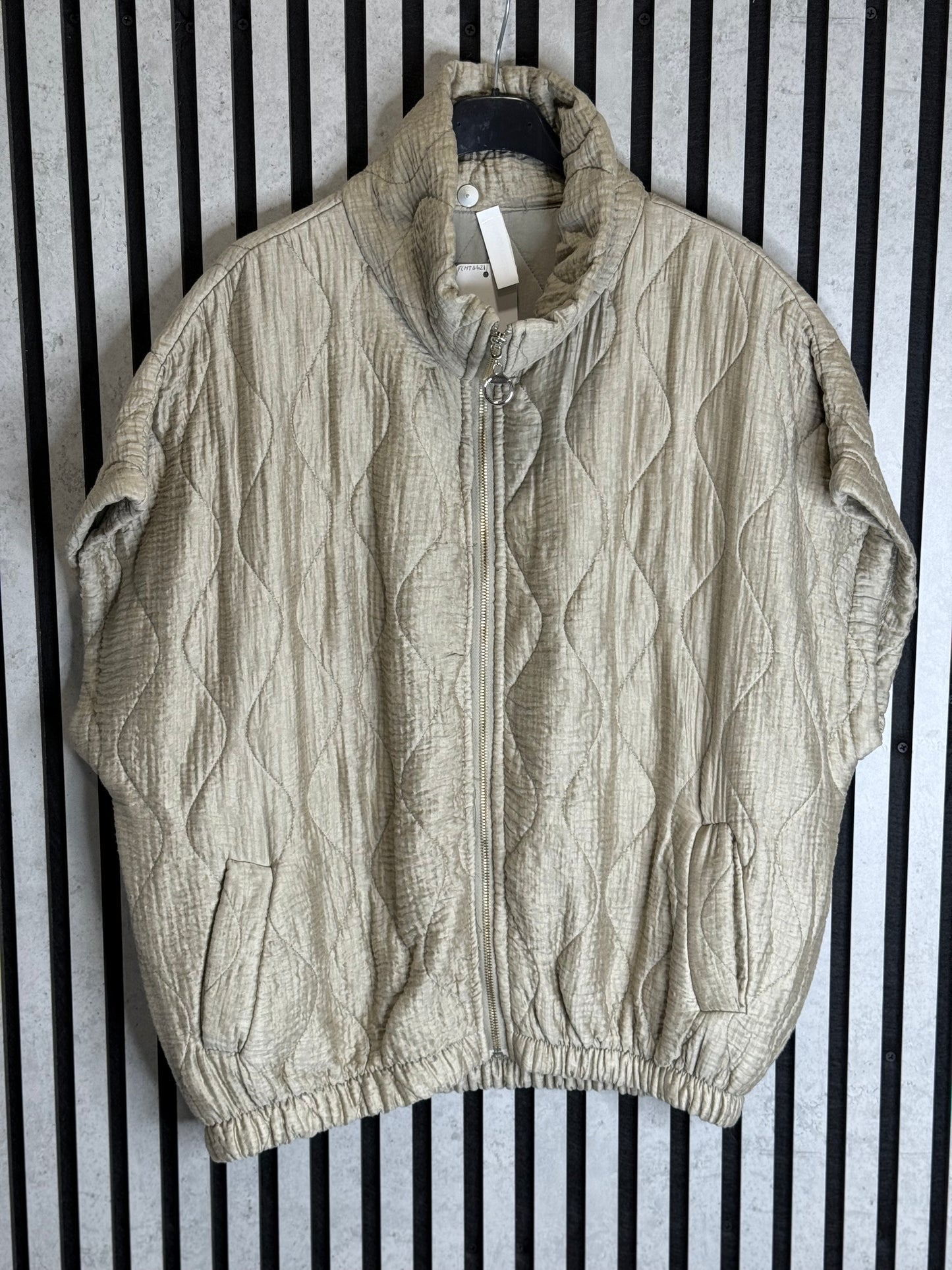 Beige Quilted Funnel Neck Gilet.