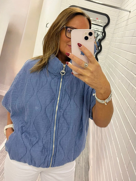 Denim Quilted Funnel Neck Gilet.